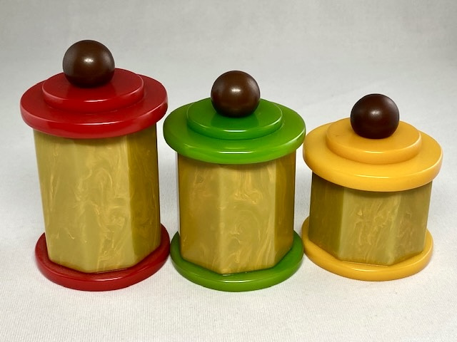 AB135 Dombek trio of bakelite trinket containers