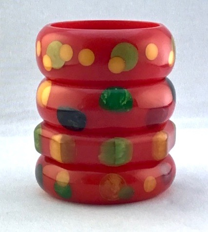 AB10 stack dotted red Bakelite Bangles