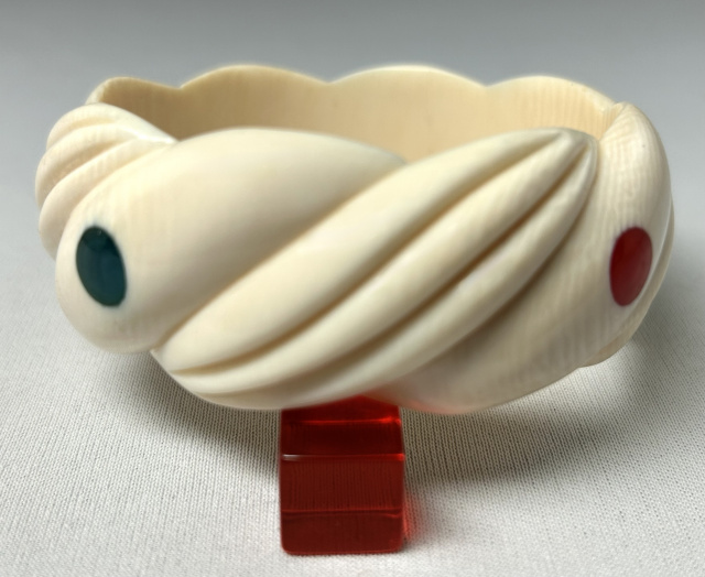 AP25 ivory with red and blue bakelite dots bakelite bangle