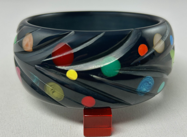 AP22 wide cobalt with slash carving and confetti dots bakelite bangle