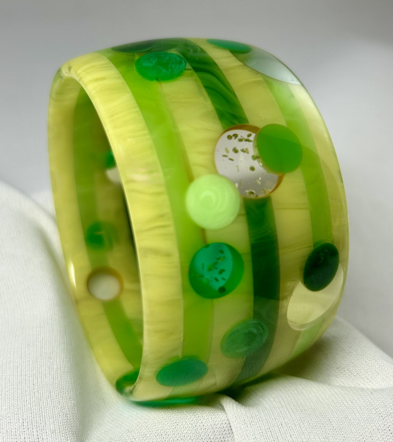 AP25 wide yellow & green stripes and dots bakelite bangle