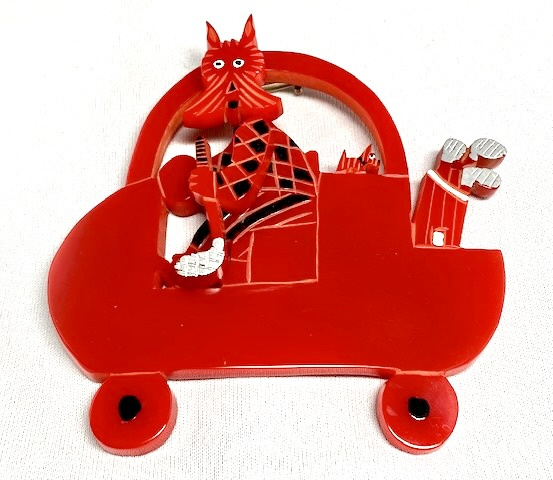 Foltz16 red bakelite golf cart scottie pin