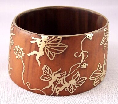 PO8 signed PONO horn bangle w golden fairies