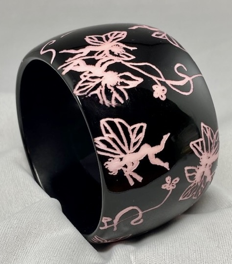 PO38 pink/black PONO resin bangle w fairy carving