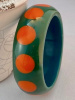 AB53 teal/orange dots bangle