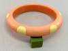 AB63 Brandon 6 dot pinkish orange bakelite bangle